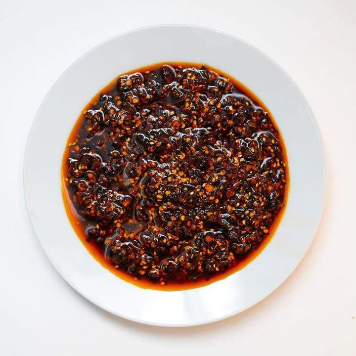Momofuku Chili Crunch. Distributed by Alpha Omega Imports
